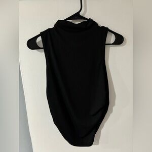 Black Sleeveless Turtleneck Top